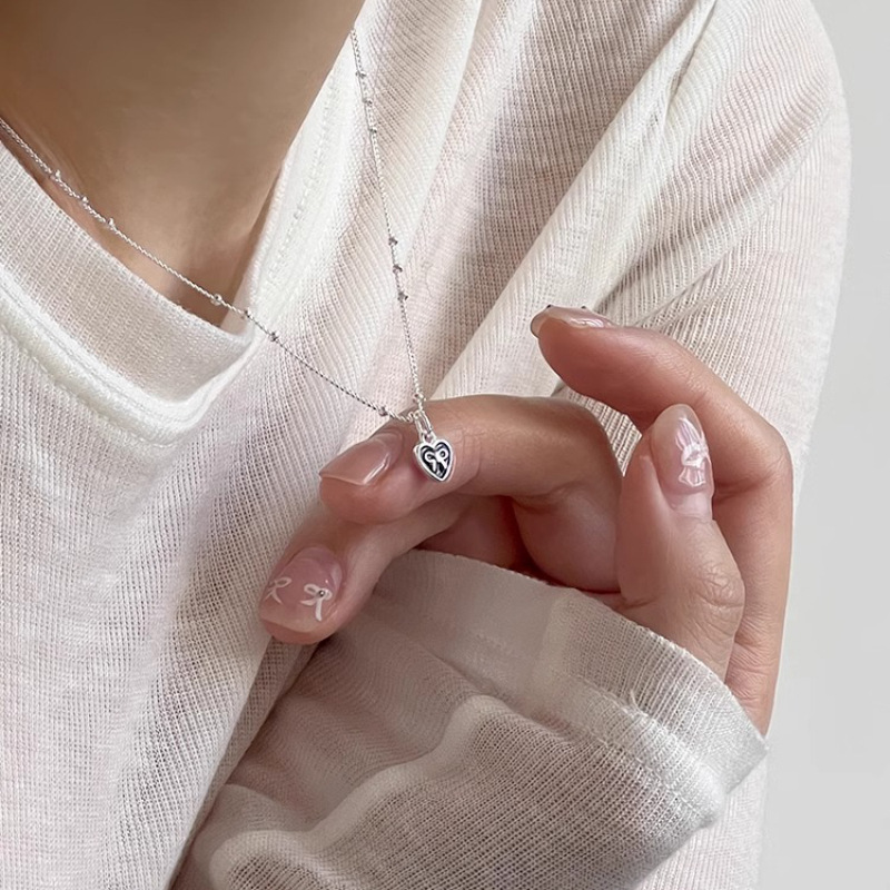 قلادة قلب حب من الفضة الإسترلي - مراجعة Tie Clip Silver وسعره